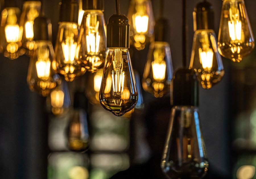 Warm Edison bulbs hanging from the ceiling